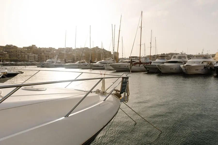 View over the bow rail across Grand Harbour Marina